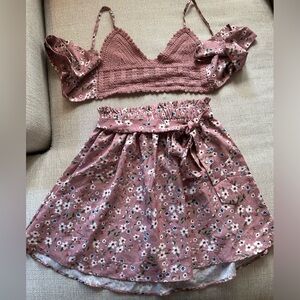 Two piece outfit with a shirt and bralette top.